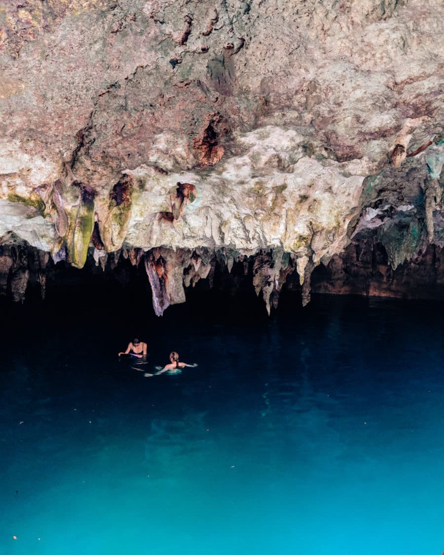 swimming in a cenote in Cancun, Mexico