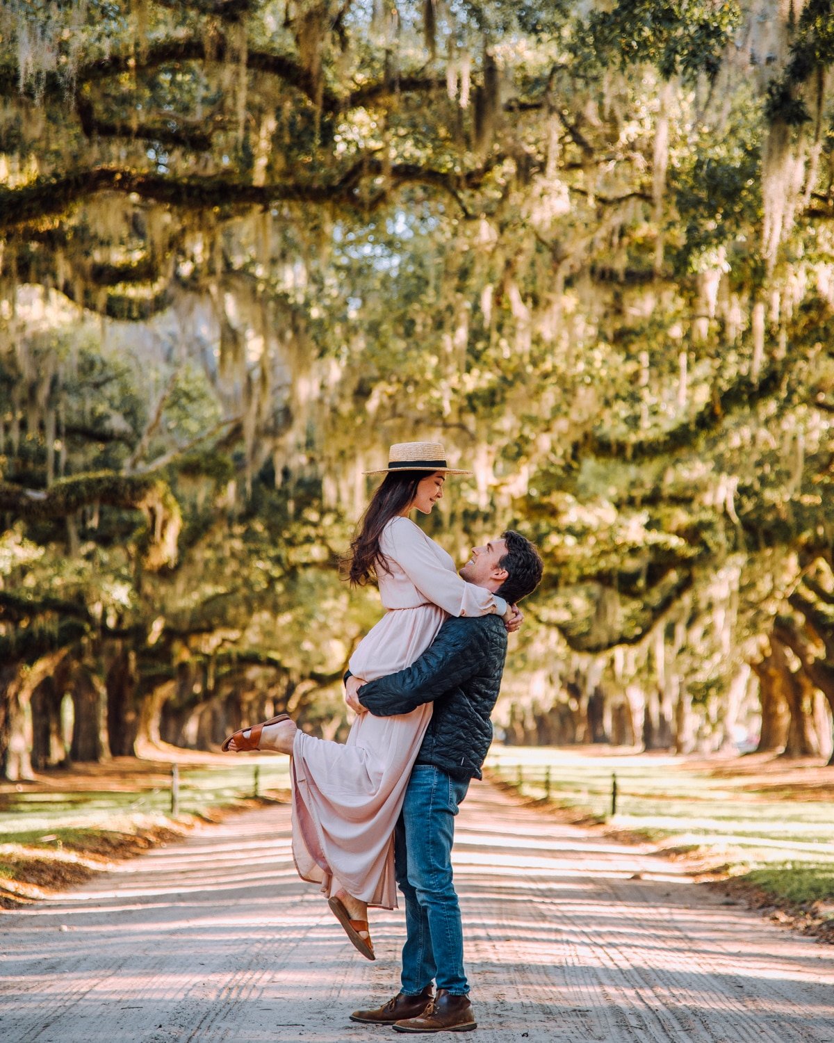 Couple under live oak tree tunnel at Boone Hall Plantation