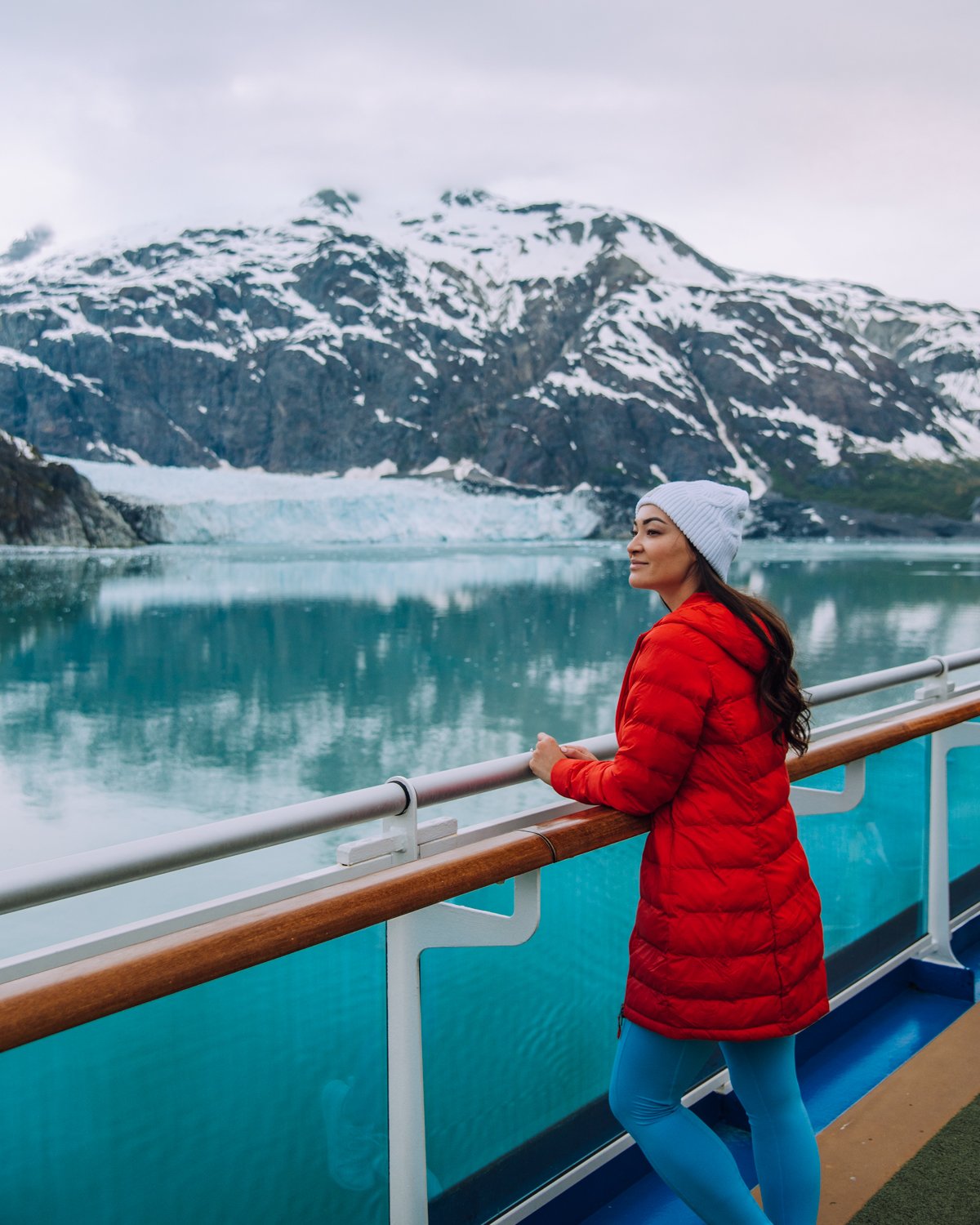 Girl on cruise ship at Margerie Glacier in Glacier Bay