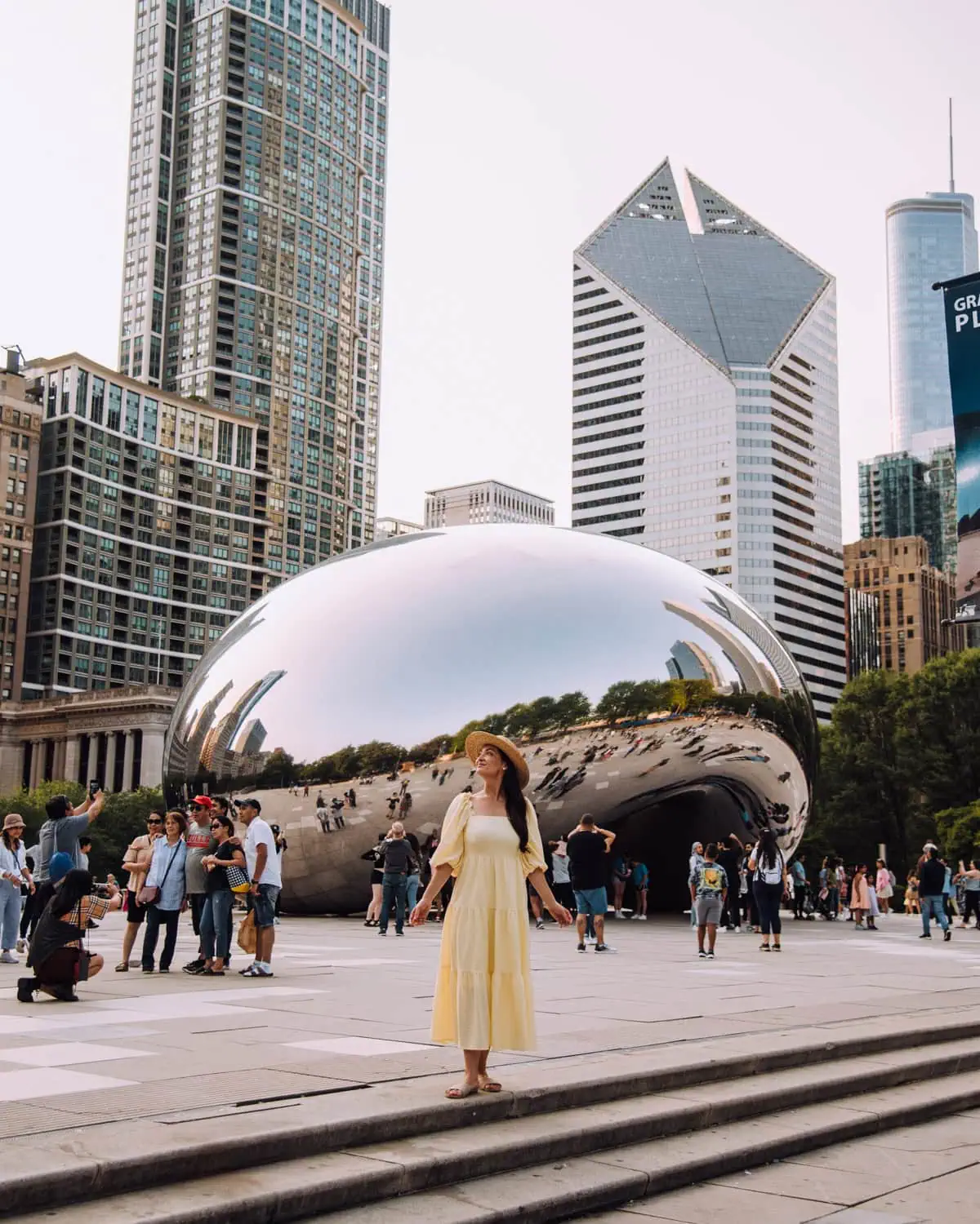 Girl in front of the Bean in the afternoon