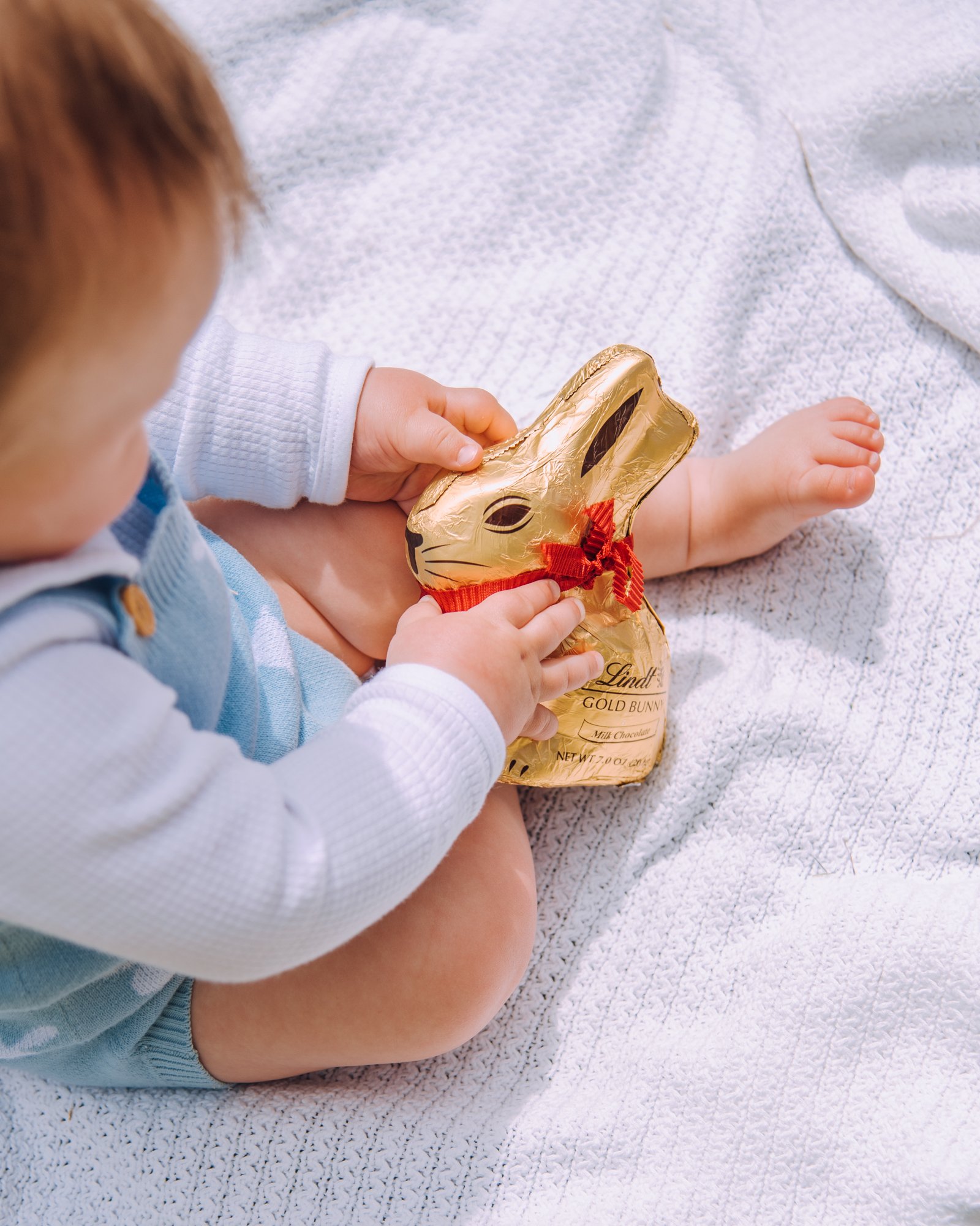 Spring Baby Photoshoot Ideas - Baby with a Chocolate Bunny