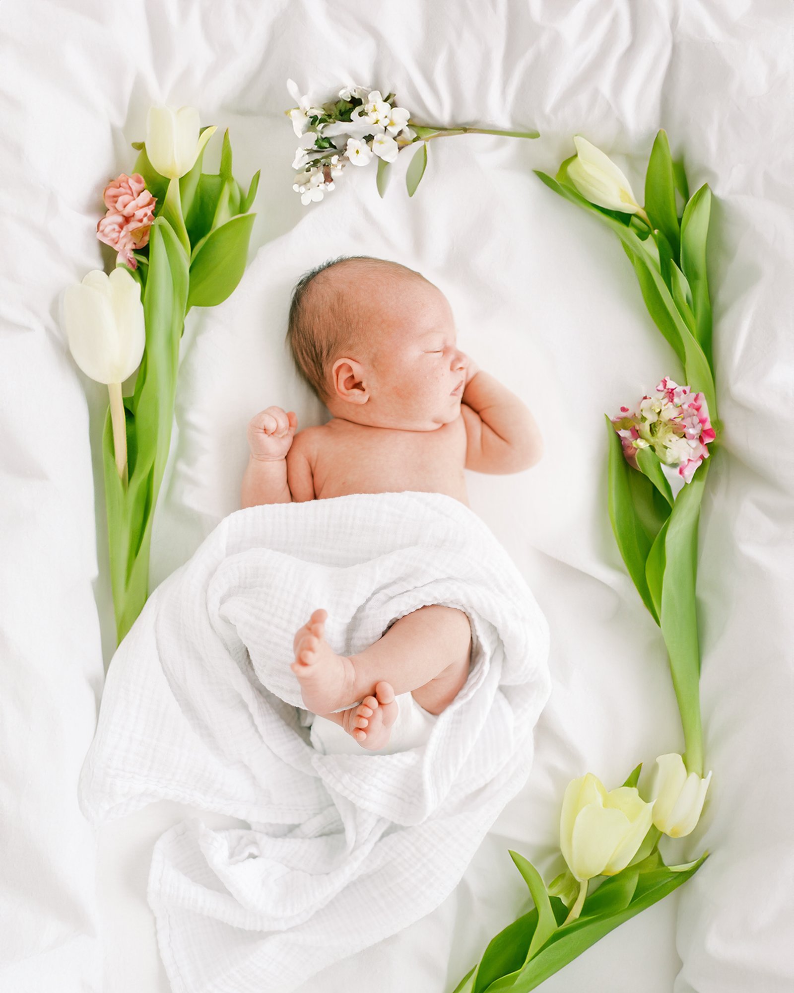Spring Baby Photoshoot Ideas - Baby Surrounded by Flowers