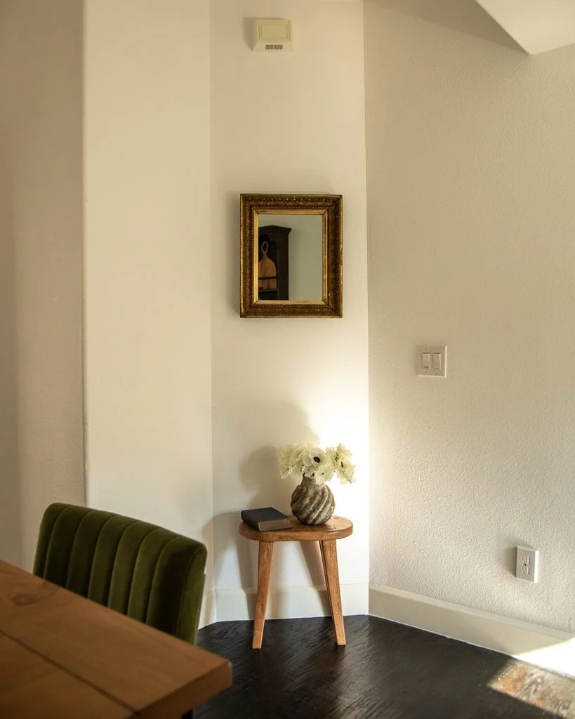 Antique Mirror Hung Above Stool