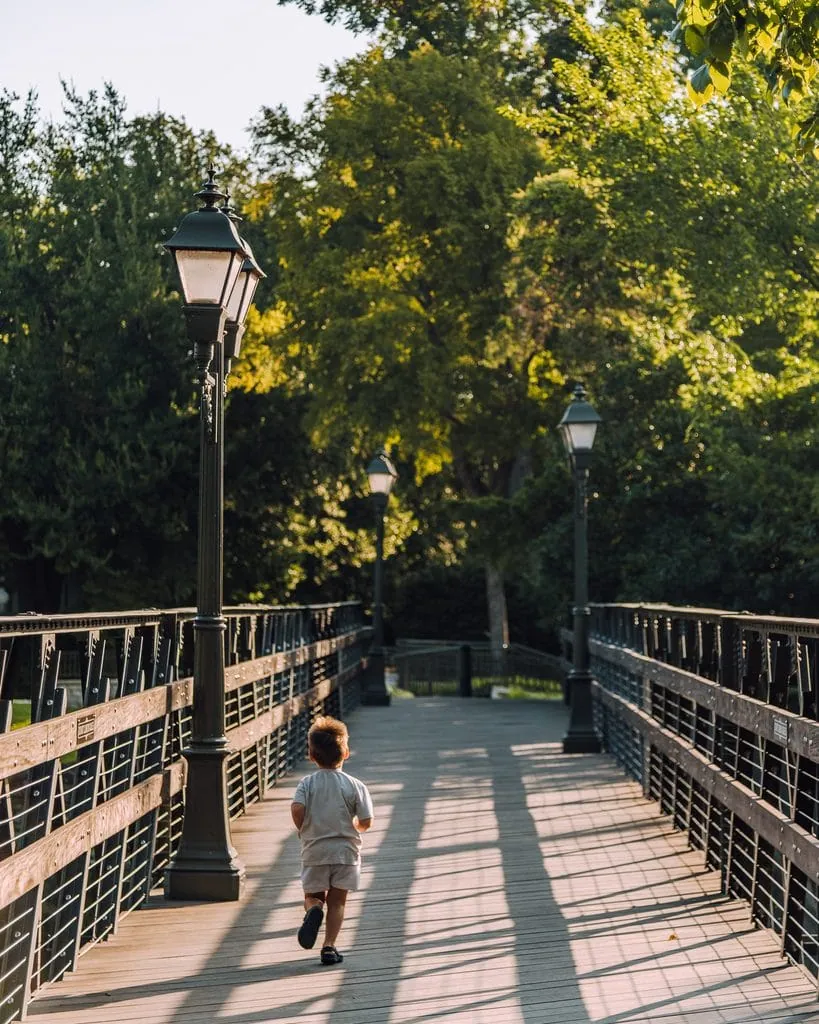 Running Across The Bridge At Lakeside Park Dallas
