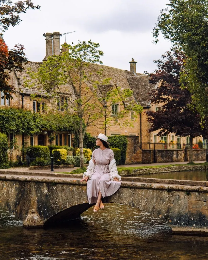 Sitting On The Bridge In Bourton On The Water