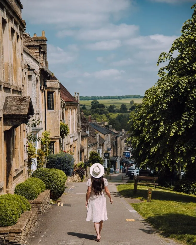 Walking Down The Sidewalk In Burford In The Cotswolds